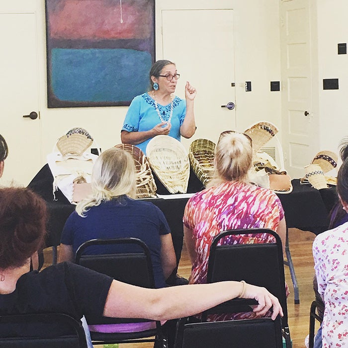 Sara Barton demonstrates Paiute Willow Basket weaving and Cradle Boards.