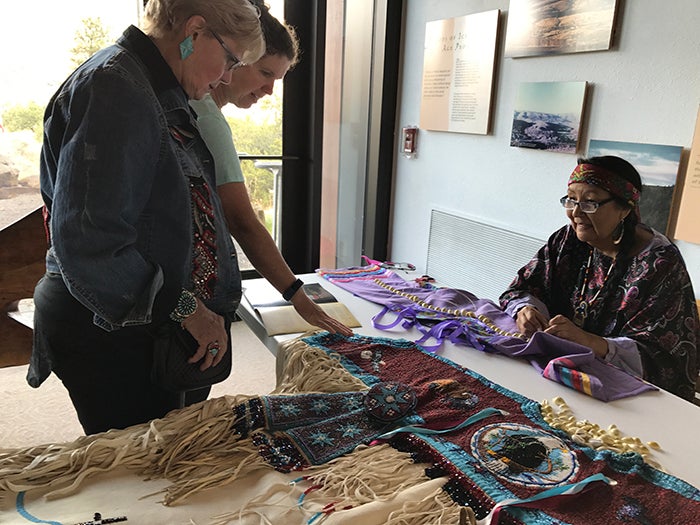 Roberta Kirk demonstrates traditional beadwork