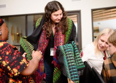 Artist shared Palestinian embroidery with other artists; OFN What We Do Banner