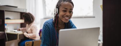 Student enjoying a virtual museum tour from inside their dorm room