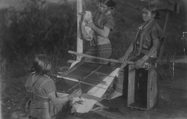 Cloth was woven on a simple loom that controlled warp tension with a strap fastened around the weaver’s hips