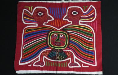 Mola with birds and a human face