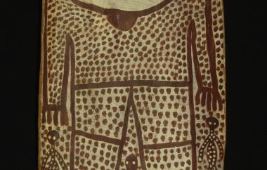 Bark painting of a human figure with dots