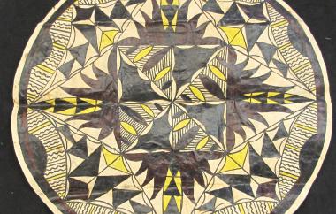 Circular tapa cloth with yellow pigment