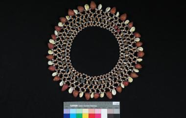 Beaded collar with seed beads, dyed large beads, and shells
