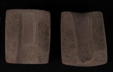 Ceramic bivalve mold for a small bronze adze or ax.