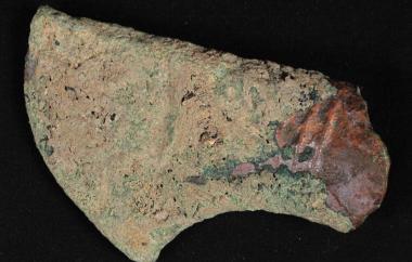 Copper-based or bronze metal tool that would have been hafted on a wooden handle