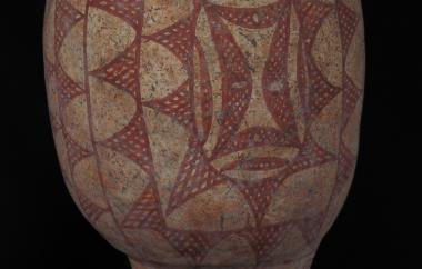 Pedestaled vase with a cross-hatched geometric design motif