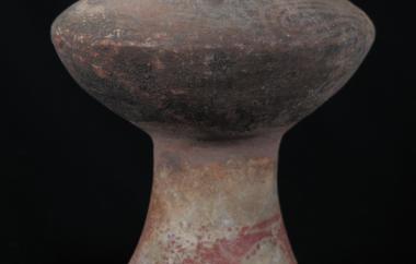 Possible fake or composite pedestaled jar, containing different colored clays