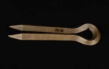 Woman's heavy brass hairpin