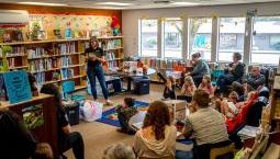Library presentation of exhibit with audience of children